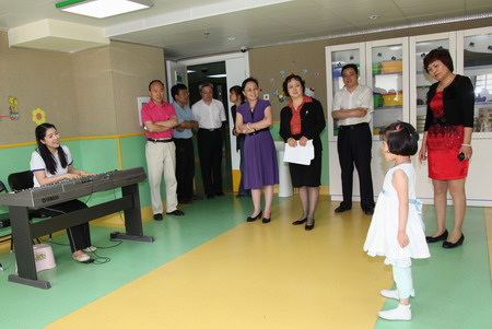 北京市残疾人联合会-市残联理事长吴文彦到市残疾人康复服务指导中心调研工作